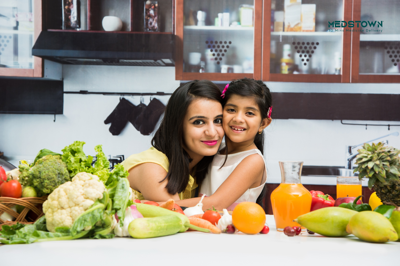 Mother with daugter shareing food
