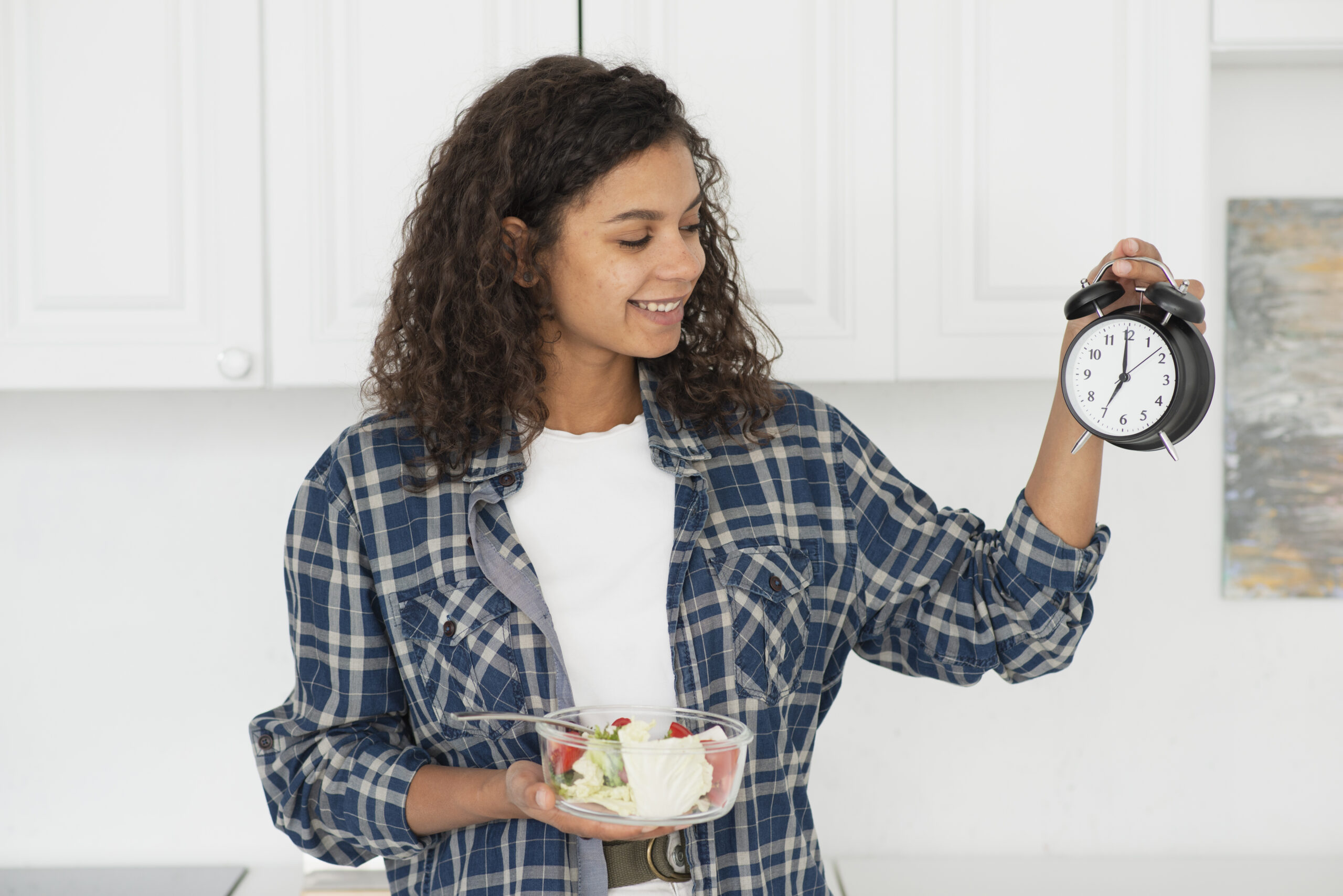 woman holding bowl salad clock scaled