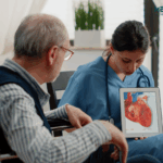 Doctor explaining medical information on tablet.