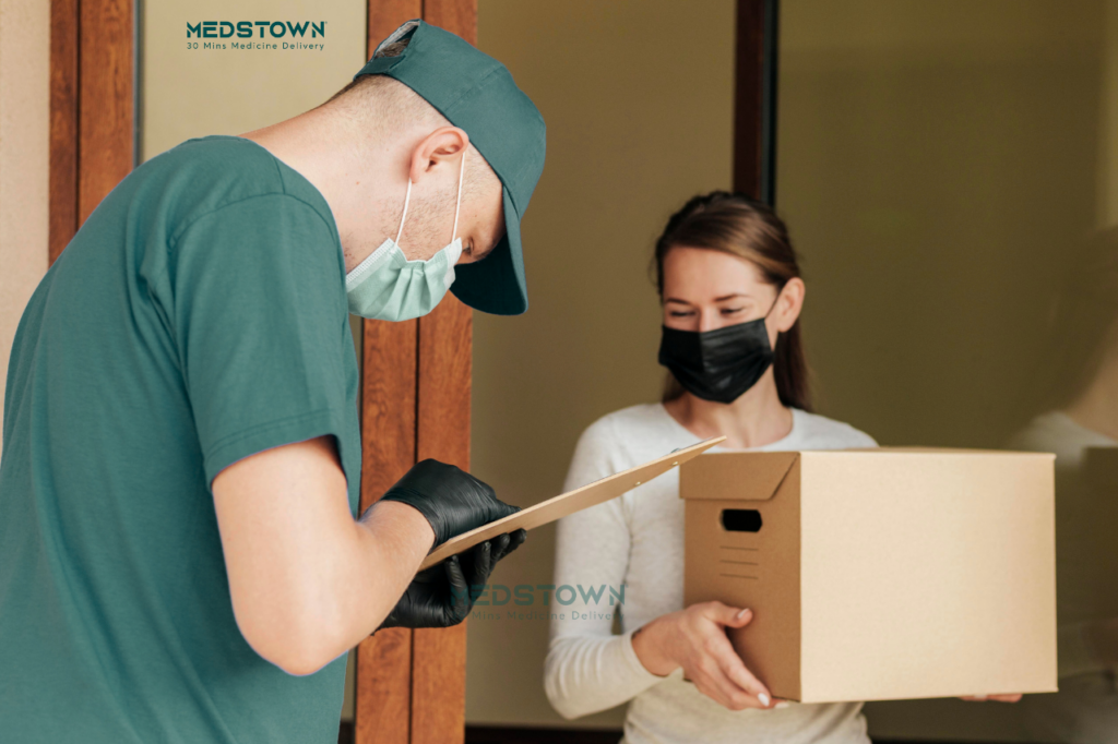 Delivery person handing over a package.